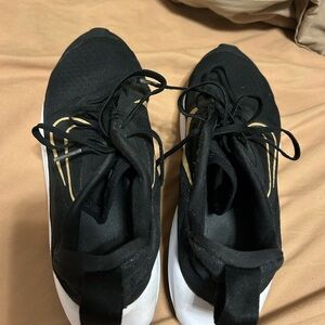 Nike Black and Gold Sneakers